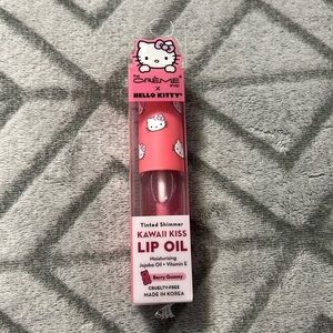 The crème shop and hello kitty tinted pink shimmer lip oil!